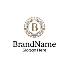 Elegant ornamental floral emblem logo design template