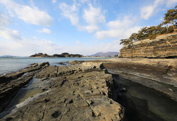 Sedimentary sea rocks and cliffs at Chudo Island near Yeosu-si, South Korea 