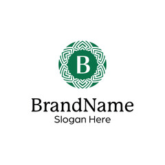 Elegant ornamental floral emblem logo design template