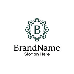 Elegant ornamental floral emblem logo design template