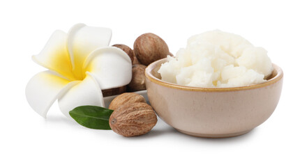 Shea butter in bowl, flower and nuts isolated on white