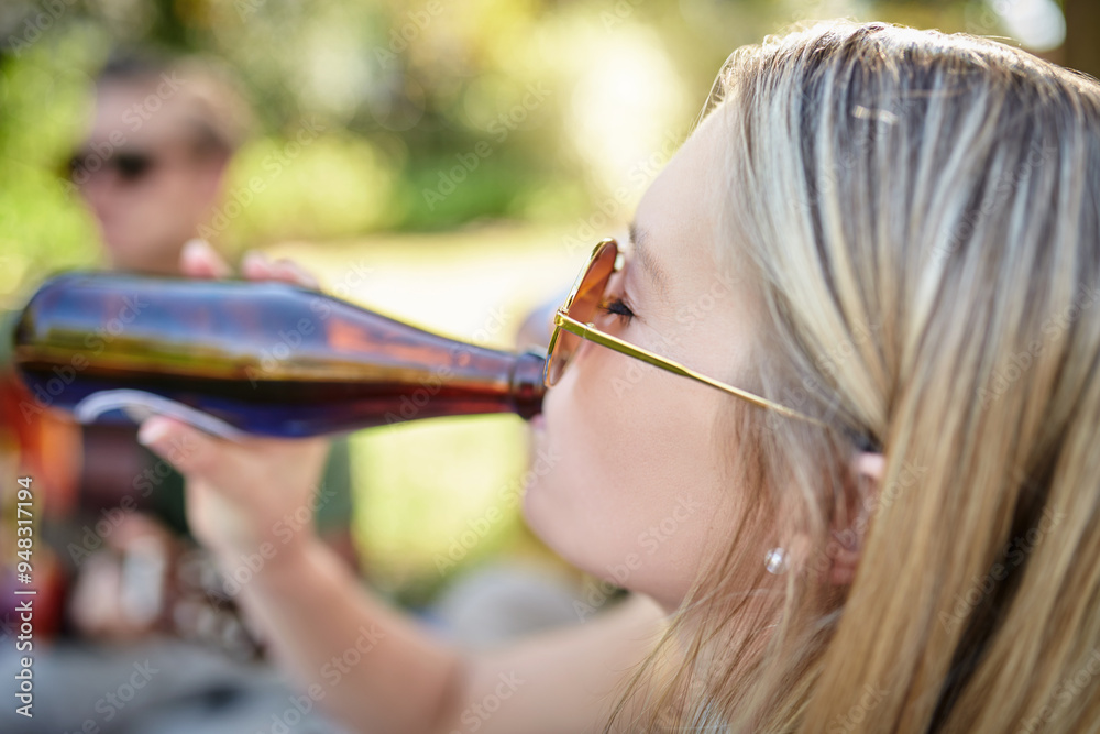 Poster Beer, drinking and face of woman outdoor in nature with friends for party or picnic in summer. Alcohol, bottle and sunglasses with person in park for celebration or social gathering on weekend