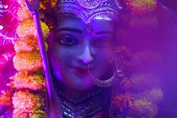illuminated statue of goddess durga face