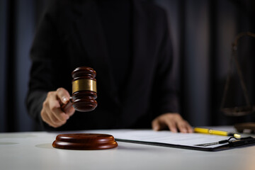 Female lawyer discussing legal advice, bidding, decision making.