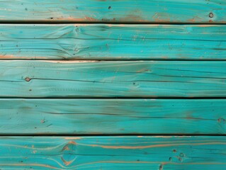 Fototapeta premium Weathered turquoise wooden planks enhancing a coastal vibe on a sunny afternoon