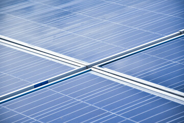 Closeup solar rooftop panels which are clean and clear after washing, soft focus, maintenance concepts, new edited.