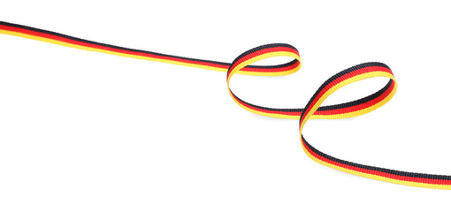 Naklejka premium Ribbon in colors of German flag isolated on white