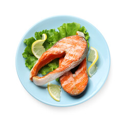 Tasty grilled salmon steaks, lettuce and lemon isolated on white, top view