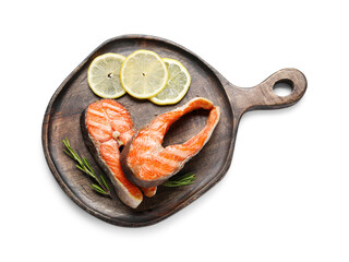 Tasty grilled salmon steaks, lemon and rosemary isolated on white, top view