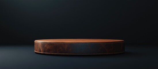 Obraz premium Wooden podium with a leather base rendered in a dark room