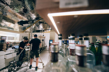 Illuminators with lighting equipment, lighting devices on the set. Lighting production for filming movies, advertising