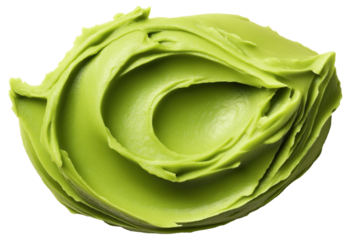 Light green cream or lotion dollop swirled on a white background. Excellent for cosmetic or skincare product representation.