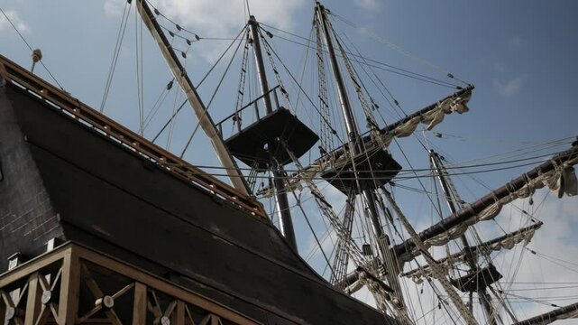stern shot of a historic 18th century Spanish sailing ship with Spanish flag, Andalusia.