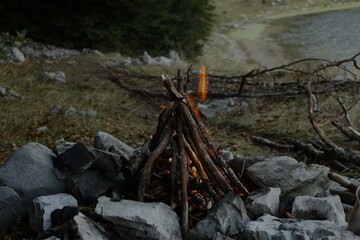 CAMPFIRE BY THE LAKE