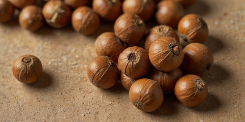 Obraz premium Top view of hazelnuts over warm beige background Fashion food concept.
