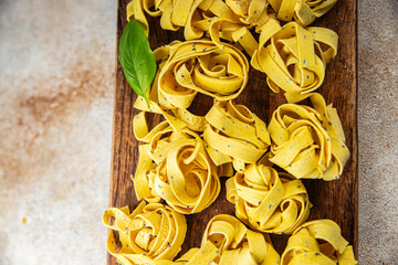 tagliatelle with chia seeds raw pasta vegetable dish Fresh delicious gourmet food background On the table rustick food top view copy space