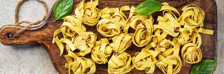 tagliatelle with chia seeds raw pasta vegetable dish Fresh delicious gourmet food background On the table rustick food top view copy space