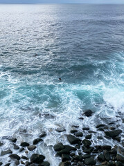 Waves crashing on rocks