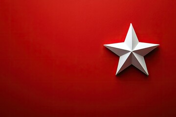 Minimalist Christmas background with a simple white star on a red backdrop