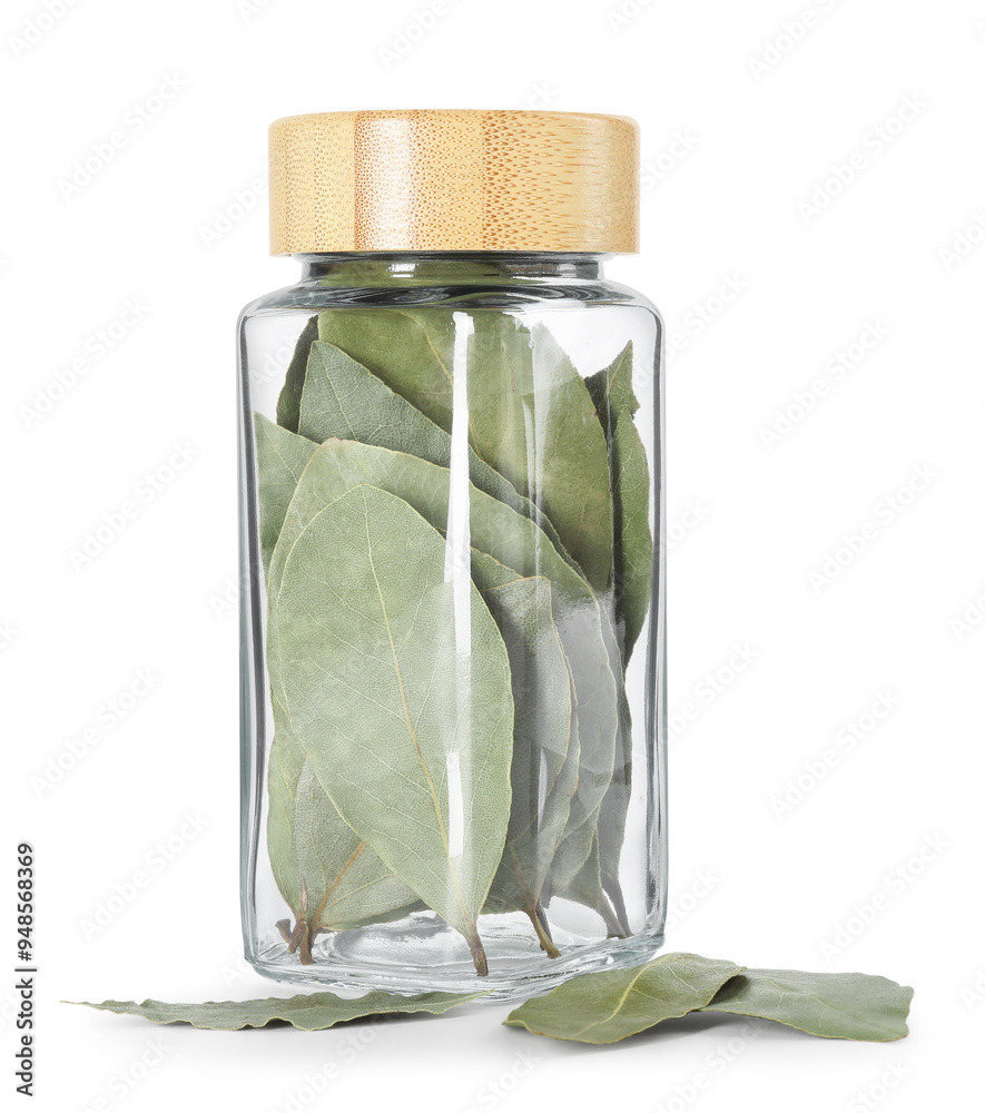 Poster Dry bay leaves in glass jar isolated on white