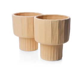 Two beige ceramic vases isolated on white