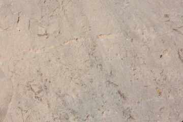 Texture of grey stone surface as background, closeup