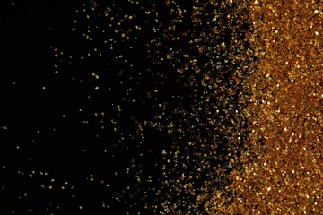 Beautiful shiny golden glitter on black background, top view