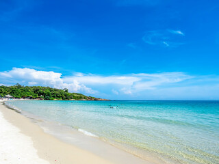 Seascape view with white sand, quiet beach, clear sea water, blue sky in summer of Koh Samet (Samet Isalnd) in Thailand