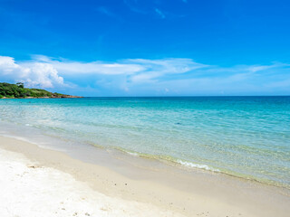 Seascape view with white sand, quiet beach, clear sea water, blue sky in summer of Koh Samet (Samet Isalnd) in Thailand