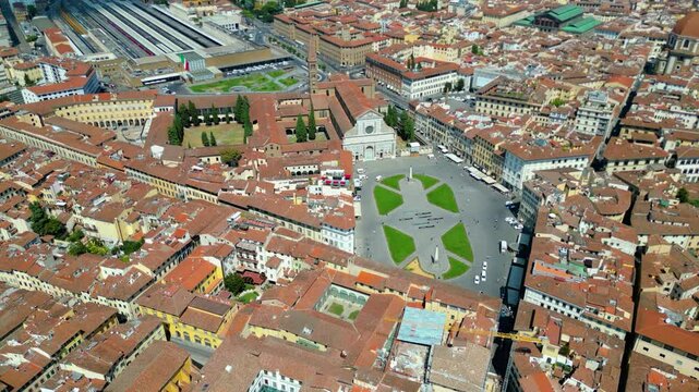 An aerial view of Florence, Italy, captured by a drone, highlighting the city's stunning Renaissance architecture and iconic landmarks. Florence, the cradle of the Renaissance, is renowned for it