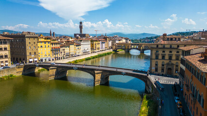 An aerial view of Florence, Italy, captured by a drone, highlighting the city's stunning Renaissance architecture and iconic landmarks. Florence, the cradle of the Renaissance, is renowned for it