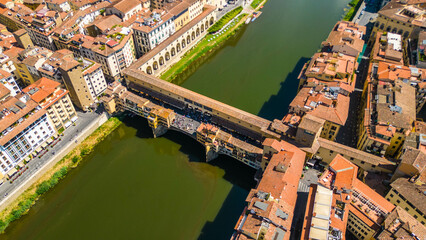 Fototapeta premium An aerial view of Florence, Italy, captured by a drone, highlighting the city's stunning Renaissance architecture and iconic landmarks. Florence, the cradle of the Renaissance, is renowned for it