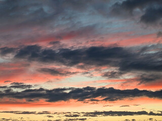 Dark Moody Thunder Clouds Sunset Clouds in a Blue Sky as A Skyscape Background