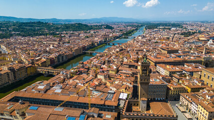 An aerial view of Florence, Italy, captured by a drone, highlighting the city's stunning Renaissance architecture and iconic landmarks. Florence, the cradle of the Renaissance, is renowned for it