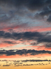 Dark Moody Thunder Clouds Sunset Clouds in a Blue Sky as A Skyscape Background