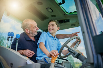 Agriculture, father and son on tractor for teaching, love and bonding together with happiness. Family, dad and boy on farming vehicle for drive, learning and child development with smile on break