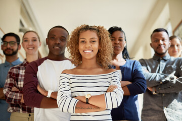 Portrait, university students and happy with arms crossed on campus for teamwork sand collaboration. People, friends and about us as college classmates with smile or confidence for future career