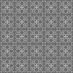 Fototapeta premium Seamless pattern with flower shapes consisting of interwoven white lines on a gray background. Suitable for various creative projects or decorative elements.