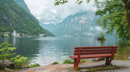 Obraz premium Tranquil summer lake mirroring snow capped peaks under fluffy clouds with scenic bench view