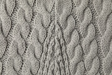Texture of grey knitted fabric as background, top view
