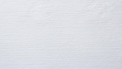 Close up of a white textured paper surface, showcasing its unique patterns and texture.