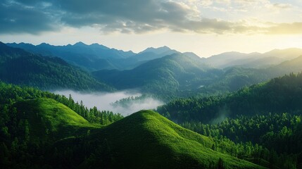Fototapeta premium Breathtaking mountain landscape at sunrise, showcasing lush green hills and misty valleys, evoking tranquility and natural beauty.