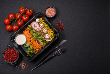 Fresh juicy salad with meat, mozzarella, carrots, lettuce, corn