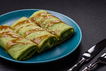 Spinach Crepes stuffed with chicken, mushrooms, salt and spices