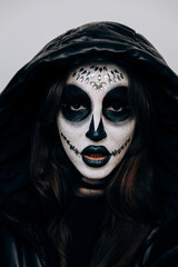 Girl with Halloween style makeup posing for the camera