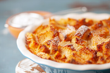 Homemade easy sweet dessert. Bread pudding in baking pan. Grandma's recipe