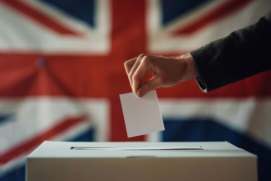 A person is voting in a box with a British flag in the background