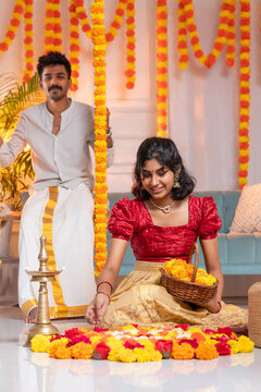 Kerala people celebrating Onam by making Flower decoration, Haopy Onam background