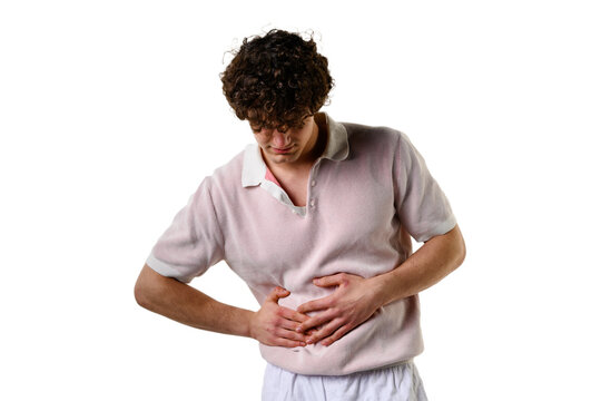 Appendicitis. Suffering from severe inflammation of appendix. Feeling acute abdominal pain and cramping from colitis. Nonspecific ulcerative colitis negatively affects large intestine.