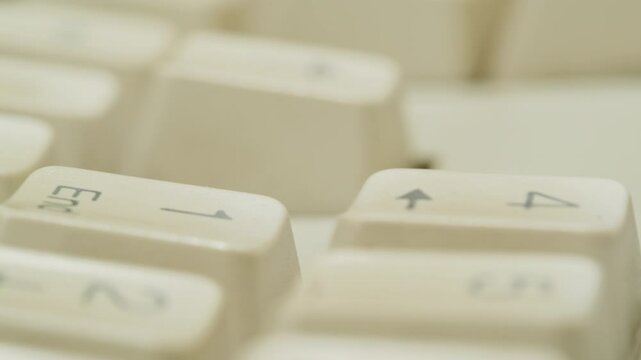 Old vintage keyboard retro pc close-up , Old computer studio close-up, Desktop vintage retro wave display, late 90s PC.